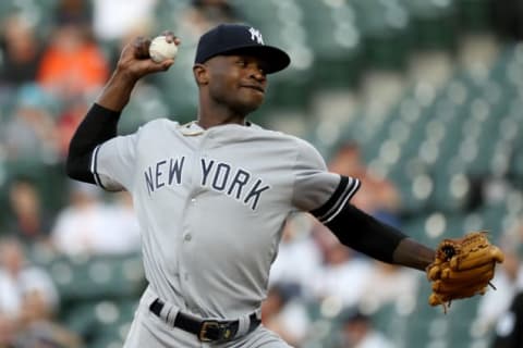 BALTIMORE, MARYLAND – MAY 21: Starting pitcher Domingo German #55 of the New York Yankees throws to a Baltimore Orioles batter in the first inning at Oriole Park at Camden Yards on May 21, 2019 in Baltimore, Maryland. (Photo by Rob Carr/Getty Images)