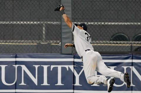 New York Yankees CF Aaron Hicks makes a spectacular catch (Photo by Hannah Foslien/Getty Images)