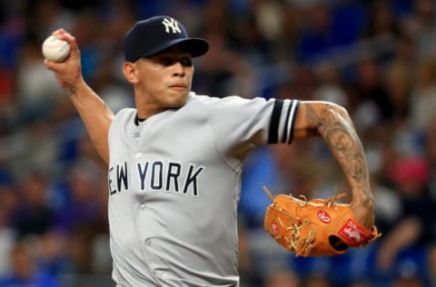 ST PETERSBURG, FLORIDA - SEPTEMBER 25: Jonathan Loaisiga #43 of the New York Yankees pitches in the first inning during a game against the Tampa Bay Rays at Tropicana Field on September 25, 2019 in St Petersburg, Florida. (Photo by Mike Ehrmann/Getty Images)