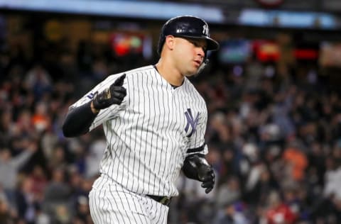 NEW YORK, NEW YORK - OCTOBER 17: Gary Sanchez #24 of the New York Yankees rounds the bases as he hits a two-run home run against the Houston Astros during the sixth inning in game four of the American League Championship Series at Yankee Stadium on October 17, 2019 in New York City. (Photo by Elsa/Getty Images)