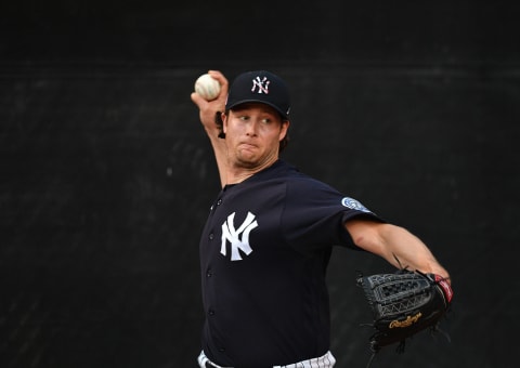 TAMPA, FLORIDA – FEBRUARY 24: Gerrit Cole #45 of the New York Yankees warms up in the bullpen before the spring training game against the Pittsburgh Pirates at Steinbrenner Field on February 24, 2020 in Tampa, Florida. (Photo by Mark Brown/Getty Images)