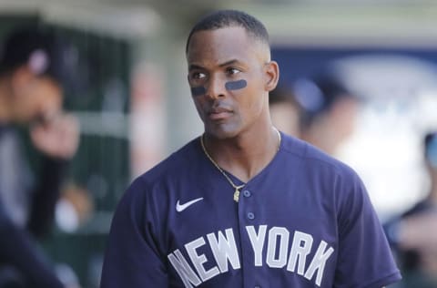 Miguel Andujar #41 of the New York Yankees stands in the dugout. (Photo by Michael Reaves/Getty Images)