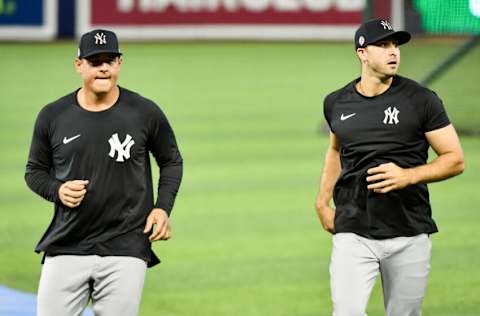 MIAMI, FL - JULY 30: Anthony Rizzo #48 and Joey Gallo #13 of the New York Yankees warm up before the game against the Miami Marlins at loanDepot park on July 30, 2021 in Miami, Florida. (Photo by Eric Espada/Getty Images)