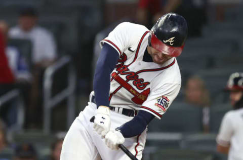 ATLANTA, GA – OCTOBER 02: Freddie Freeman #5 of the Atlanta Braves hits a single during the first inning of the game against the New York Mets at Truist Park on October 2, 2021 in Atlanta, Georgia. (Photo by Todd Kirkland/Getty Images)