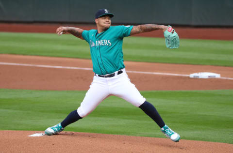 SEATTLE, WASHINGTON - JULY 31: Taijuan Walker #99 of the Seattle Mariners pitches in the first inning against the Oakland Athletics during their Opening Day game at T-Mobile Park on July 31, 2020 in Seattle, Washington. (Photo by Abbie Parr/Getty Images)