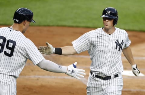 NEW YORK, NEW YORK - AUGUST 03: (NEW YORK DAILIES OUT) DJ LeMahieu #26 of the New York Yankees celebrates his home run against the Philadelphia Phillies with teammate Aaron Judge #99 at Yankee Stadium on August 03, 2020 in New York City. The Yankees defeated the Phillies 6-3. (Photo by Jim McIsaac/Getty Images)