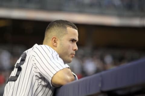 NEW YORK, NY – OCTOBER 02: (NEW YORK DAILIES OUT) Jesus Montero #63 of the New York Yankees looks on against the Detroit Tigers during Game Two of the American League Division Series at Yankee Stadium on October 2, 2011 in the Bronx borough of New York City. The Tigers defeated the Yankees 5-3 to even the best of five series at one game apiece. (Photo by Jim McIsaac/Getty Images)