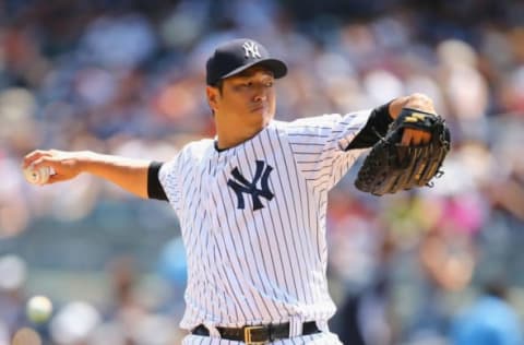 NEW YORK, NY – AUGUST 10: Hiroki Kuroda #18 of the New York Yankees pitches against the Cleveland Indians during their game at Yankee Stadium on August 10, 2014 in the Bronx borough of New York City. (Photo by Al Bello/Getty Images)