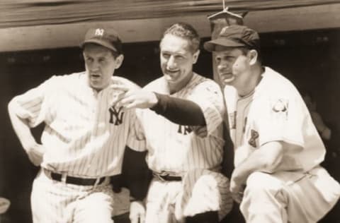 NEW YORK, NEW YORK – JULY 11, 1939. Lefty Gomez, left, and Lou Gehrig, center, of the New York Yankees, discuss the quirks of Yankee Stadium with Jimmy Foxx of the Boston Red Sox before the start of the 1939 All Star Game on July 11. (Photo by Mark Rucker/Transcendental Graphics, Getty Images)