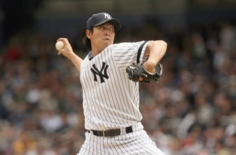 NEW YORK – APRIL 29: Chien-Ming Wang #40 of the New York Yankees delivers the pitch against the Boston Red Sox at Yankee Stadium on April 29, 2007 in the Bronx borough of New York City. (Photo by Nick Laham/Getty Images)