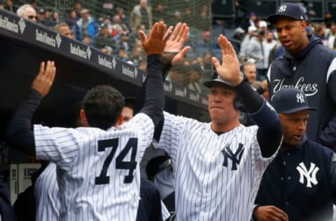 NEW YORK, NY – APRIL 04: Aaron Judge #99 and Ronald Torreyes #74 of the New York Yankees celebrate against the Tampa Bay Rays at Yankee Stadium on April 4, 2018 in the Bronx borough of New York City. The Yankees defeated the Rays 7-2. (Photo by Jim McIsaac/Getty Images)