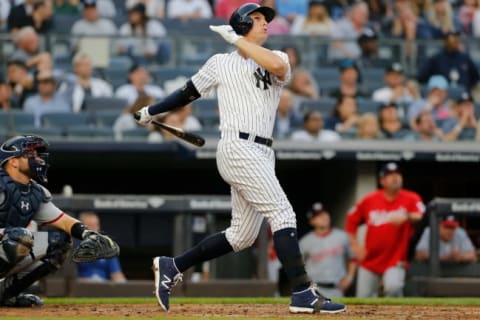 NEW YORK, NY – JUNE 13: Greg Bird #33 of the New York Yankees follows through on a home run in the second inning against the Washington Nationals at Yankee Stadium on June 13, 2018 in the Bronx borough of New York City. (Photo by Jim McIsaac/Getty Images)