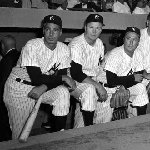 Former outfielder Joe DiMaggio #5, pitcher Spurgeon “Spud” Chandler #21 and infielder George “Snuffy” Stirnweiss #1 of the New York Yankees – (Photo by: Olen Collection/Diamond Images/Getty Images)