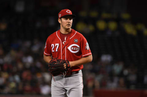 PHOENIX, ARIZONA - SEPTEMBER 15: Trevor Bauer #27 of the Cincinnati Reds delivers a pitch against the Arizona Diamondbacks at Chase Field on September 15, 2019 in Phoenix, Arizona. (Photo by Norm Hall/Getty Images)