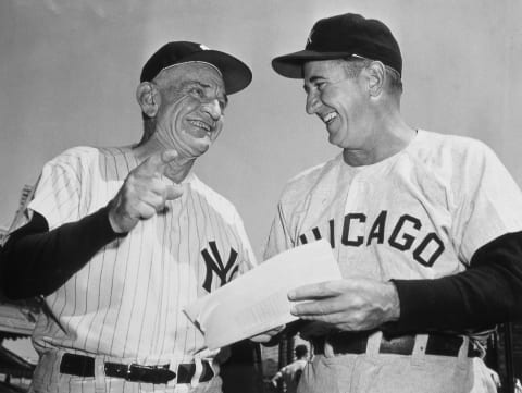 Casey Stengel, left, manager of the New York Yankees, talks with Chicago White Sox manager Al Lopez on– (Photo by Mark Rucker/Transcendental Graphics, Getty Images)