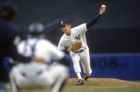 NEW YORK - CIRCA 1985: Pitcher Dave Righetti #19 of the New York Yankees pitches during a Major League Baseball game circa 1985 at Yankee Stadium in the Bronx borough of New York City. Righetti played for the Yankees from 1979-90. (Photo by Focus on Sport/Getty Images)