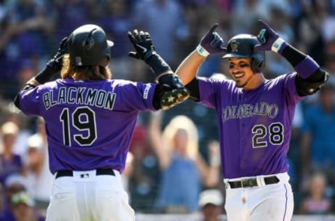 Rockies stars Nolan Arenado and Charlie Blackmon (Photo by Dustin Bradford/Getty Images)