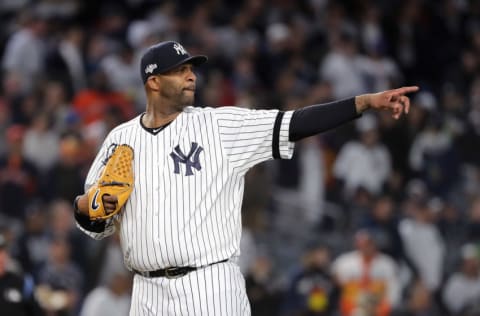 NEW YORK, NEW YORK - OCTOBER 17: CC Sabathia #52 of the New York Yankees reacts against the Houston Astros during the eighth inning in game four of the American League Championship Series at Yankee Stadium on October 17, 2019 in New York City. (Photo by Elsa/Getty Images)