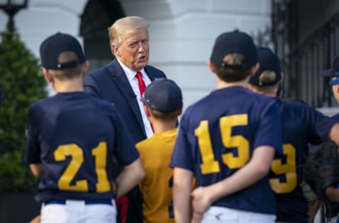 WASHINGTON, DC - JULY 23: U.S. President Donald Trump talks with youth baseball players on the South Lawn of the White House on July 23, 2020 in Washington, DC. President Trump and former New York Yankees Hall of Fame pitcher Mariano Rivera met with youth baseball players to celebrate Opening Day of Major League Baseball. (Photo by Drew Angerer/Getty Images)