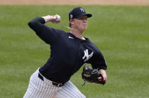 Nick Nelson #79 of the New York Yankees throws from the mound during summer workouts at Yankee Stadium on July 13, 2020 in New York City. (Photo by Jim McIsaac/Getty Images)