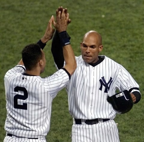 New York Yankees left fielder David Justice (R)(DOUG KANTER/AFP via Getty Images)