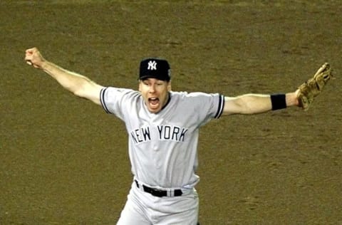 SAN DIEGO, : Scott Brosius of the New York Yankees jumps for joy after the Yankees defeated the San Diego Padres, 3-0, in game four of the World Series 21 October at Qualcomm Stadium in San Diego, CA. The Yankees swept the series 4-0 and Brosius was named the Most Valuable Player of the series. (ELECTRONIC IMAGE) AFP PHOTO Don EMMERT (Photo credit should read DON EMMERT/AFP via Getty Images)