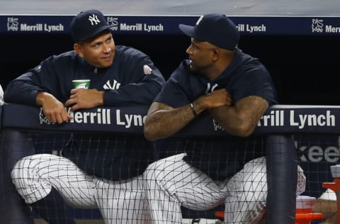 NEW YORK, NY - AUGUST 04: Alex Rodriguez #13 and CC Sabathia #52 of the New York Yankees watch the action from the dugout against the New York Mets a game at Yankee Stadium on August 4, 2016 in the Bronx borough of New York City. (Photo by Rich Schultz/Getty Images)