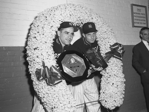 Catcher Yogi Berra and pitcher Bob Grim, of the New York Yankees (Photo by: Olen Collection/Diamond Images/Getty Images)