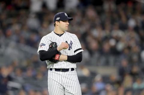 NEW YORK, NEW YORK - OCTOBER 04: Tommy Kahnle #48 of the New York Yankees reacts after giving up a solo home run hit by Miguel Sano #22 of the Minnesota Twins during the sixth inning in game one of the American League Division Series at Yankee Stadium on October 04, 2019 in New York City. (Photo by Elsa/Getty Images)