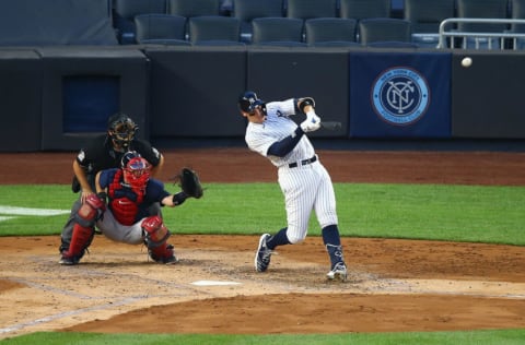 NEW YORK, NEW YORK - AUGUST 02: Aaron Judge #99 of the New York Yankees hits a 3-run home run in the second inning against the Boston Red Sox at Yankee Stadium on August 02, 2020 in New York City. (Photo by Mike Stobe/Getty Images)