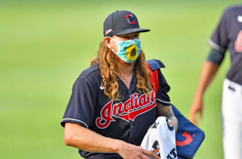 Starting pitcher Mike Clevinger #52 of the Cleveland Indians waves to a teammate prior to the gam against the Pittsburgh Pirates at Progressive Field on July 20, 2020 in Cleveland, Ohio. (Photo by Jason Miller/Getty Images)