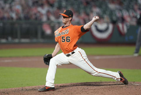 Tony Watson #56 of the San Francisco Giants pitches against the Texas Rangers in the top of the eighth inning at Oracle Park on July 31, 2020 in San Francisco, California. (Photo by Thearon W. Henderson/Getty Images)