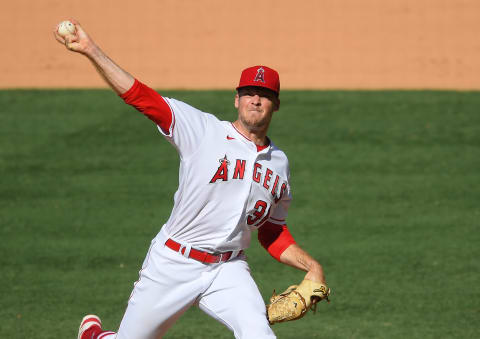 Ty Buttrey #31 of the Los Angeles Angels pitches during the game against the Houston Astros at Angel Stadium of Anaheim on August 2, 2020 in Anaheim, California. (Photo by Jayne Kamin-Oncea/Getty Images)