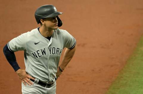 Giancarlo Stanton #27 of the New York Yankees looks on during Game 1 of a doubleheader against the Tampa Bay Rays at Tropicana Field on August 08, 2020 in St Petersburg, Florida. (Photo by Mike Ehrmann/Getty Images)