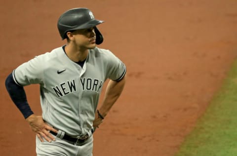 Giancarlo Stanton #27 of the New York Yankees looks on during Game 1 of a doubleheader against the Tampa Bay Rays at Tropicana Field on August 08, 2020 in St Petersburg, Florida. (Photo by Mike Ehrmann/Getty Images)