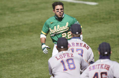 OAKLAND, CALIFORNIA - AUGUST 09: Ramon Laureano #22 of the Oakland Athletics charges towards the Houston Astros dugout after he was hit by a pitch in the bottom of the seventh inning at RingCentral Coliseum on August 09, 2020 in Oakland, California. (Photo by Thearon W. Henderson/Getty Images)