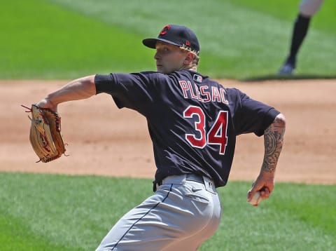 Starting pitcher Zach Plesac #34 of the Cleveland Indians delivers the ball against the Chicago White Sox at Guaranteed Rate Field on August 08, 2020 in Chicago, Illinois. (Photo by Jonathan Daniel/Getty Images)