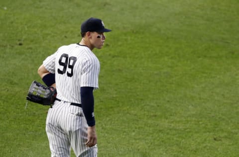 Aaron Judge #99 of the New York Yankees looks on against the Atlanta Braves at Yankee Stadium on August 11, 2020 in New York City. The Yankees defeated the Braves 9-6. (Photo by Jim McIsaac/Getty Images)