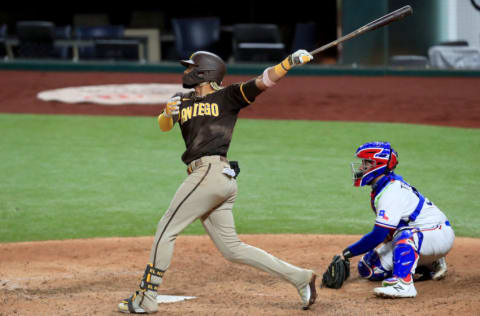 ARLINGTON, TEXAS - AUGUST 17: Fernando Tatis Jr. #23 of the San Diego Padres hits grand slam against the Texas Rangers in the top of the eighth inning at Globe Life Field on August 17, 2020 in Arlington, Texas. (Photo by Tom Pennington/Getty Images)