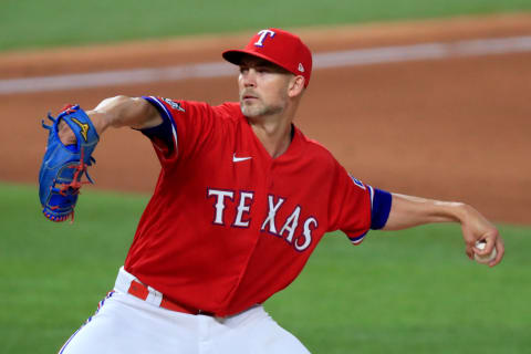 Mike Minor #42 of the Texas Rangers pitches (Photo by Tom Pennington/Getty Images)