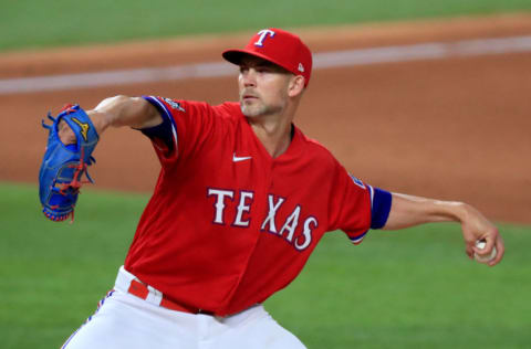 Mike Minor #42 of the Texas Rangers pitches against the Los Angeles Dodgers in the top of the fifth inning at Globe Life Field on August 28, 2020 in Arlington, Texas. All players are wearing #42 in honor of Jackie Robinson Day. The day honoring Jackie Robinson, traditionally held on April 15, was rescheduled due to the COVID-19 pandemic.” (Photo by Tom Pennington/Getty Images)