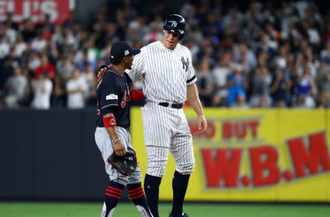 Aaron Judge #99 of the New York Yankees and Francisco Lindor #12 of the Cleveland Indians talk at second base during the sixth inning in game three of the American League Division Series at Yankee Stadium on October 8, 2017 in New York City. (Photo by Al Bello/Getty Images)