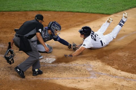 Gio Urshela #29 of the New York Yankees scores after hitting a triple on a throwing error by Willy Adames #1 of the Tampa Bay Rays in the sixth inning at Yankee Stadium on September 01, 2020 in New York City. (Photo by Mike Stobe/Getty Images)