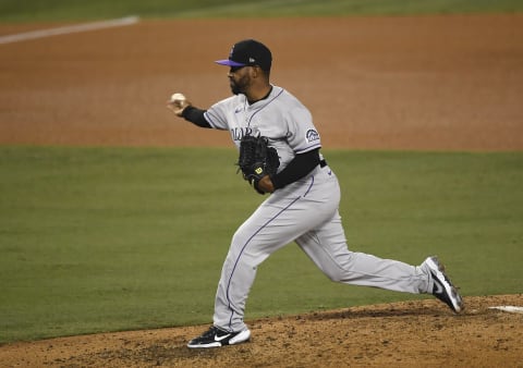 Relief pitcher Mychal Givens #60 of the Colorado Rockies throws against the Los Angeles Dodgers during the sixth inning at Dodger Stadium on September 4, 2020 in Los Angeles, California. (Photo by Kevork Djansezian/Getty Images)