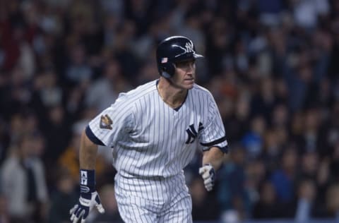 Rightfielder Paul O'Neill #21 of the New York Yankees runs to first base against the Seattle Mariners during game five of the American League Championship Series on October 22, 2001 at Yankee Stadium in the Bronx, New York. The Yankees defeated the Mariners 12-5 and won the best-of-seven series four games to one to advance to the World Series. (Photo by Ezra Shaw/Getty Images)