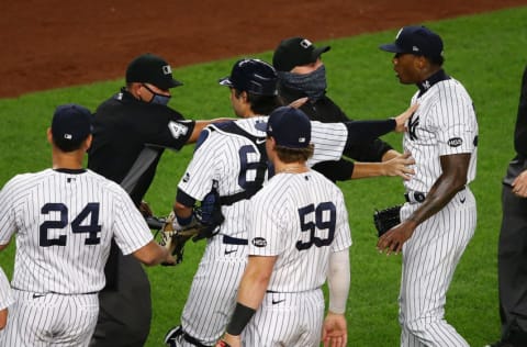 Aroldis Chapman #54 of the New York Yankees exchanges words with the Tampa Bay Rays after the final out in the ninth inning at Yankee Stadium on September 01, 2020 in New York City. (Photo by Mike Stobe/Getty Images)