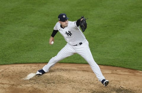 Adam Ottavino #42 of the New York Yankees pitches during the fourth inning of the second game of a doubleheader against the New York Mets at Yankee Stadium on August 28, 2020 in the Bronx borough of New York City. All players are wearing #42 in honor of Jackie Robinson Day. The day honoring Jackie Robinson, traditionally held on April 15, was rescheduled due to the COVID-19 pandemic. (Photo by Sarah Stier/Getty Images)