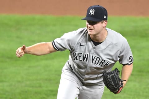 Clarke Schmidt #86 of the New York Yankees pitches during game two of a doubleheader baseball game against the New York Yankees at Oriole Park at Camden Yards on September 4, 2020 in Baltimore, Maryland. (Photo by Mitchell Layton/Getty Images)