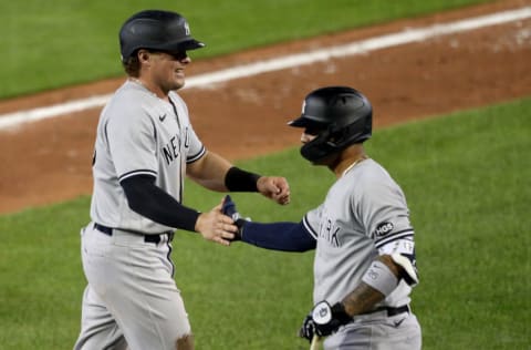 Luke Voit #59 of the New York Yankees celebrates with teammate Gleyber Torres #25 after scoring during the fifth inning against the Toronto Blue Jays at Sahlen Field on September 07, 2020 in Buffalo, New York. The Blue Jays are the home team and are playing their home games in Buffalo due to the Canadian government’s policy on coronavirus (COVID-19). (Photo by Bryan M. Bennett/Getty Images)