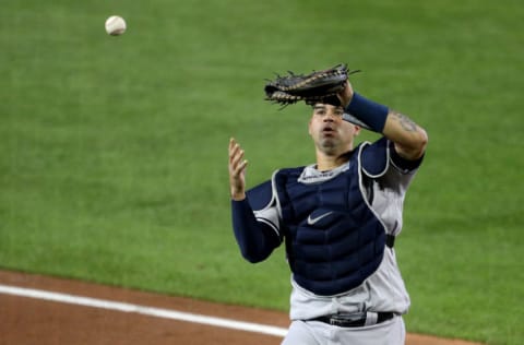 Gary Sanchez #24 of the New York Yankees reacts while dropping a foul ball hit by Cavan Biggio #8 of the Toronto Blue Jays during the fifth inning at Sahlen Field on September 08, 2020 in Buffalo, New York. The Blue Jays are the home team and are playing their home games in Buffalo due to the Canadian government’s policy on coronavirus (COVID-19). (Photo by Bryan M. Bennett/Getty Images)